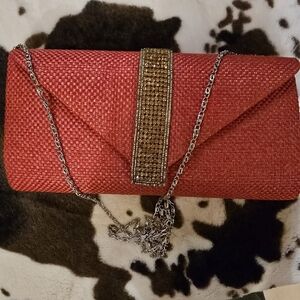Elegant Red Clutch with Gold Accents